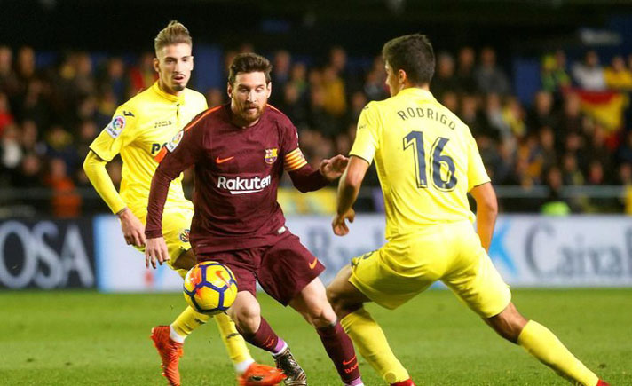 Luis Suarez dan Lionel Messi membawa Barcelona menang 2-0 atas Villarreal ketika sang pemuncak klasemen menang untuk pertama kalinya dari tiga pertandingan Liga Spanyol, untuk tetap unggul lima poin