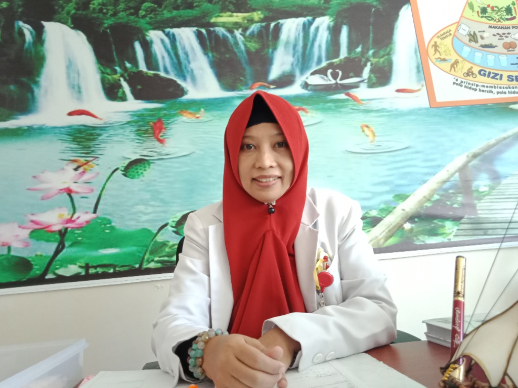 Dr. Ainun Poteng