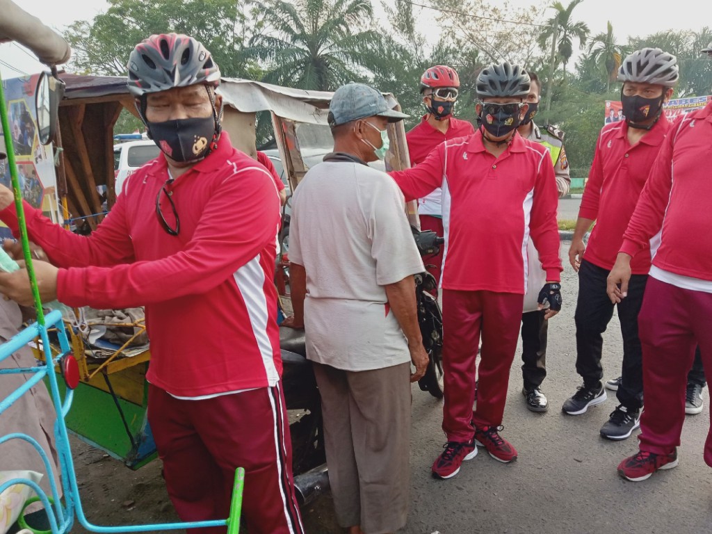 polisi dan abang becak medan