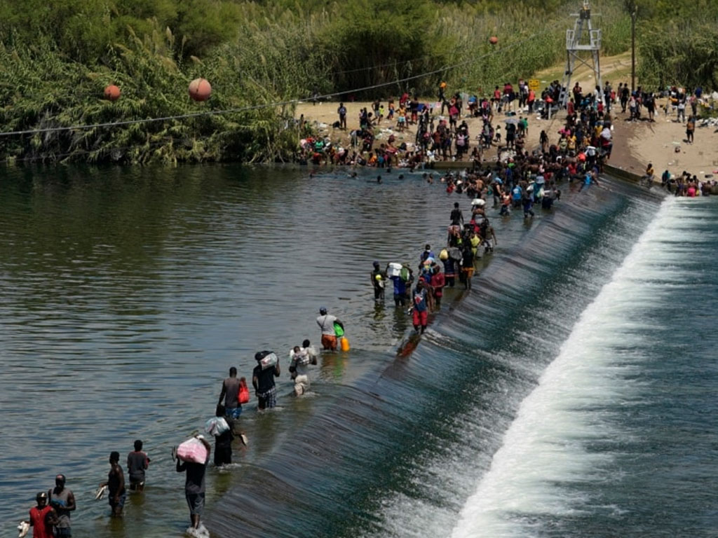 imigran haiti seberangi bendungan