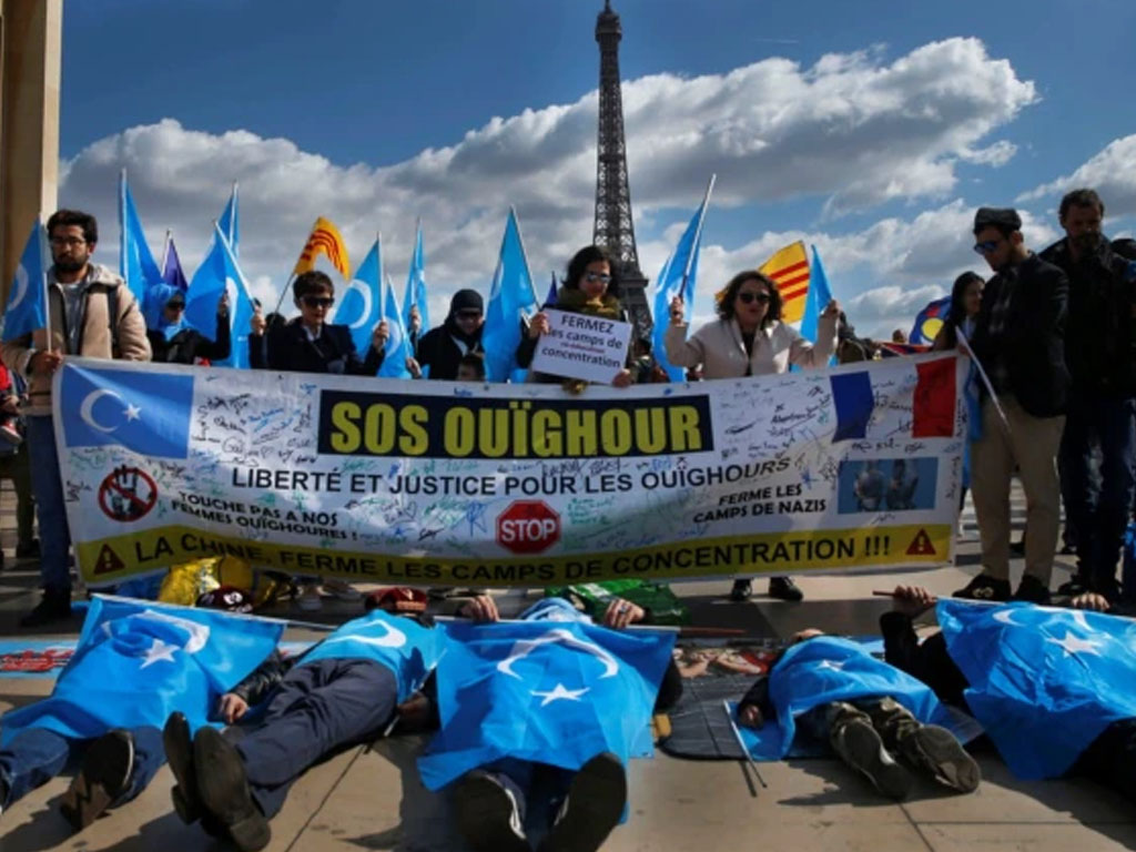 demo kominitas uighur di paris
