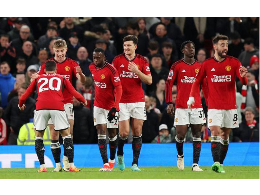 pemain MU rayakan kemenangan