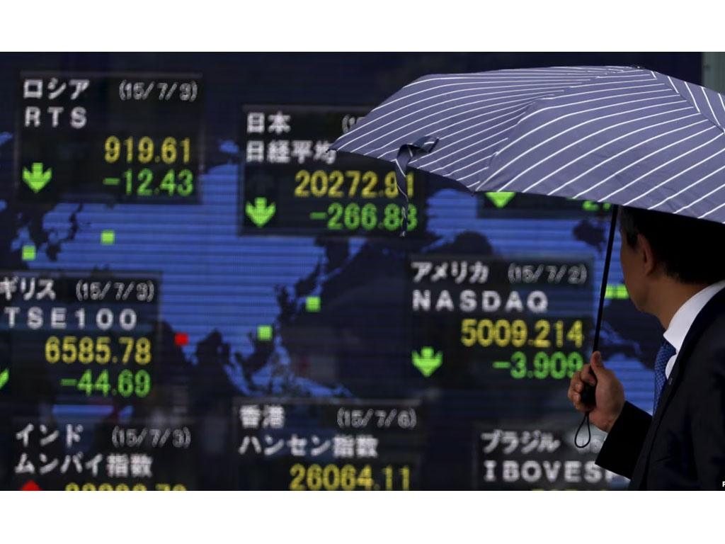 papan elektronik saham di tokyo