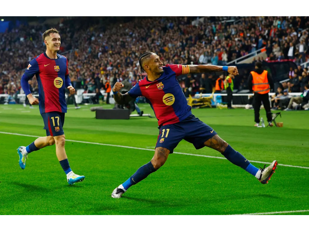 pemain barca rayakan kemenangan