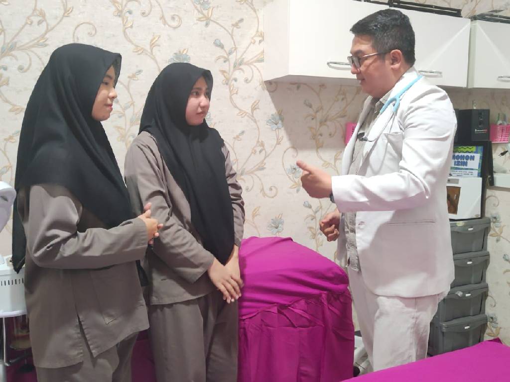 Dr. Gregory Budiman
