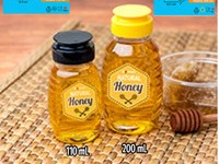 Botol kaca madu tertutup rapat